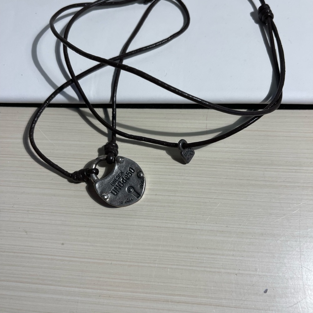 Uno de 50 Silver Anniversary Retired Lock Pendant Limited Edition